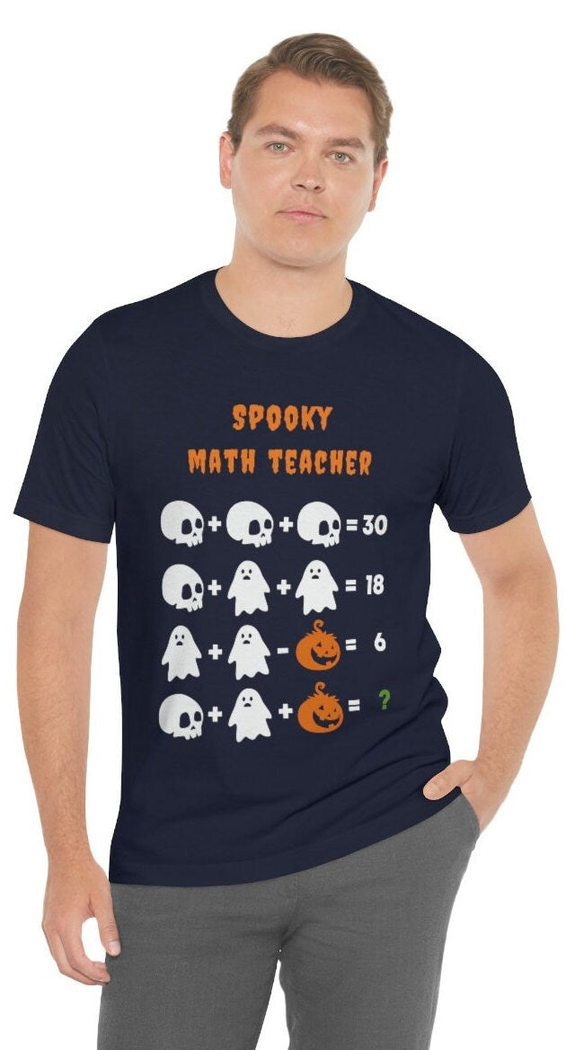 Unisex Jersey Spooky Math Teacher Short Sleeve Tee, Math Teacher Halloween Shirt, Funny Halloween T-Shirt, Pumpkin Teacher Shirt.