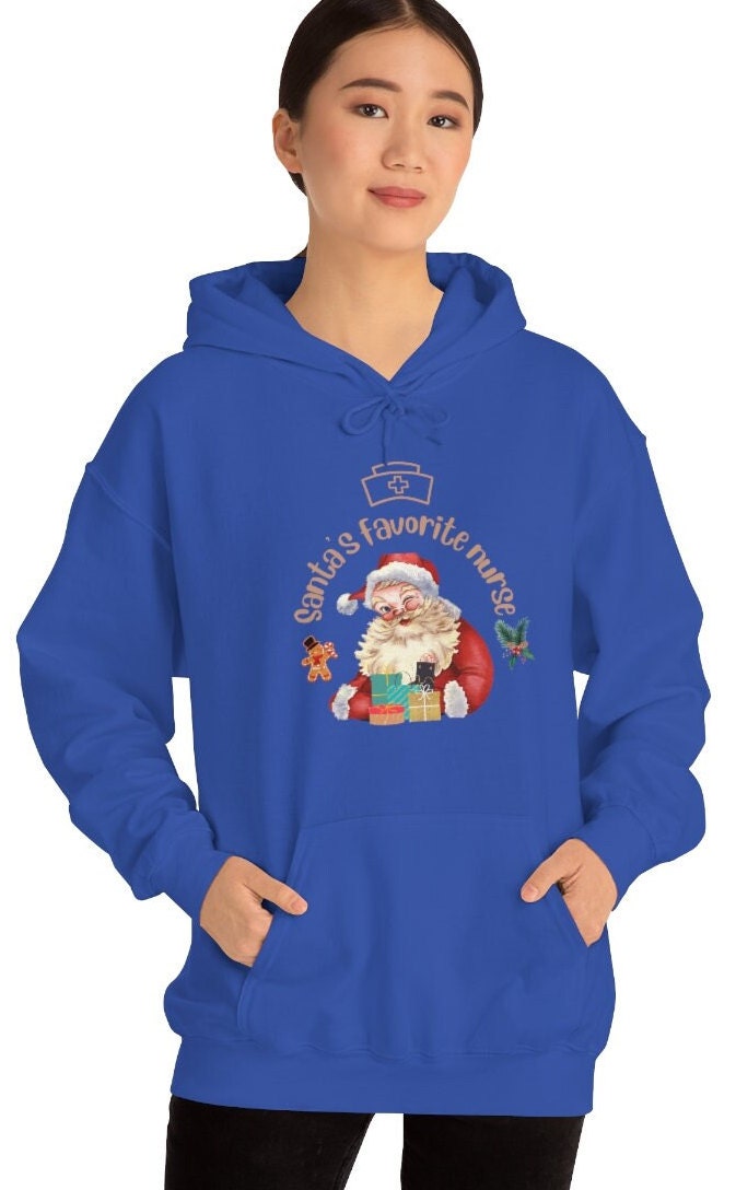 Christmas nurse Sweatshirt, Santa's Favorite Nurse Sweater, Unisex Heavy Blend Hooded Sweatshirt, Nurse Gift