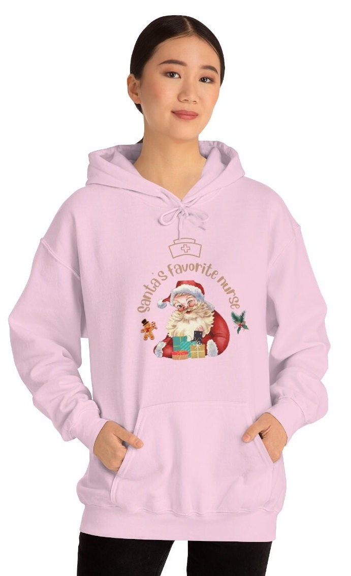 Christmas nurse Sweatshirt, Santa's Favorite Nurse Sweater, Unisex Heavy Blend Hooded Sweatshirt, Nurse Gift