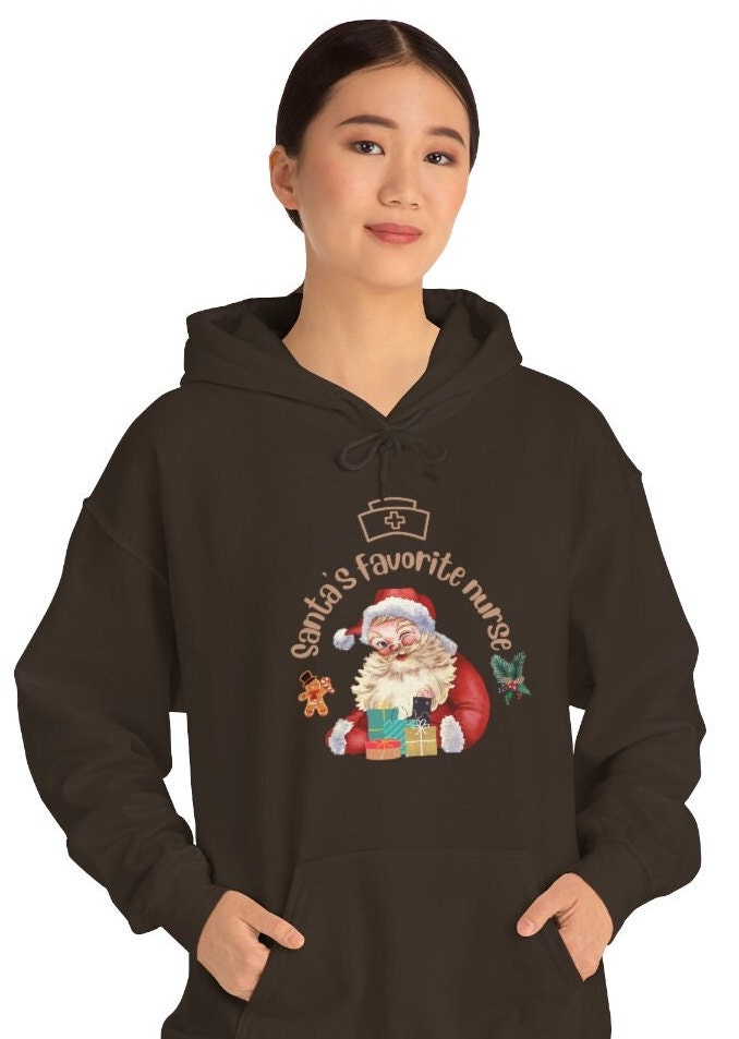 Christmas nurse Sweatshirt, Santa's Favorite Nurse Sweater, Unisex Heavy Blend Hooded Sweatshirt, Nurse Gift