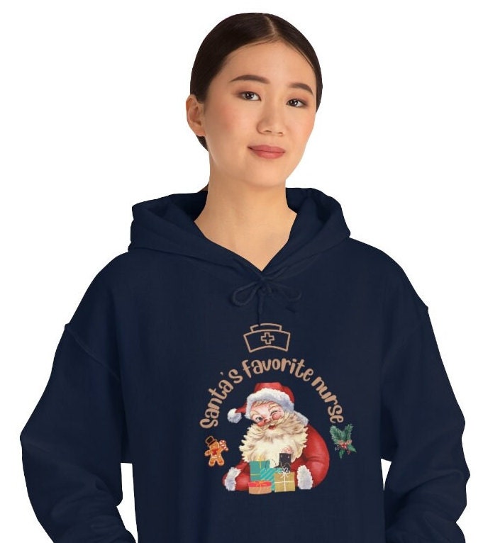 Christmas nurse Sweatshirt, Santa's Favorite Nurse Sweater, Unisex Heavy Blend Hooded Sweatshirt, Nurse Gift