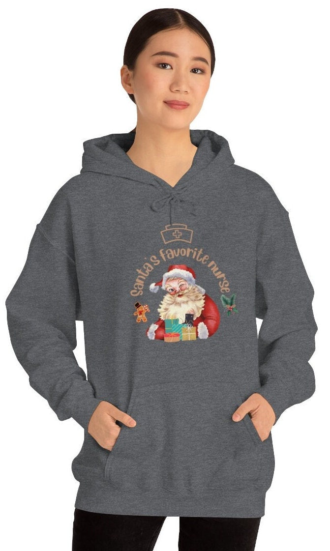 Christmas nurse Sweatshirt, Santa's Favorite Nurse Sweater, Unisex Heavy Blend Hooded Sweatshirt, Nurse Gift